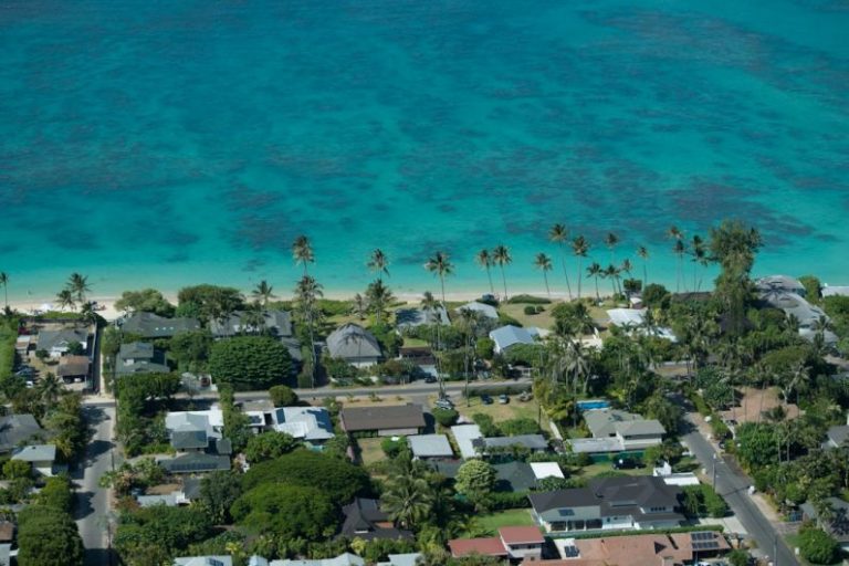 Foreclosed Properties - aerial view of beach during daytime
