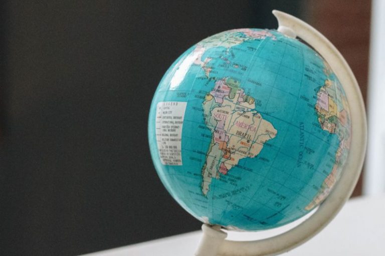 South America - close-up photo of desk globe