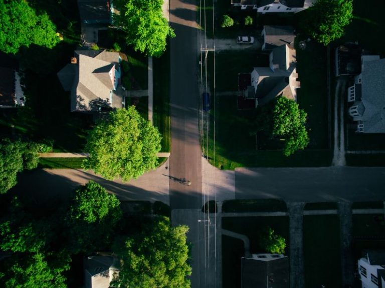 Residential Areas - an aerial view of a street with houses and trees