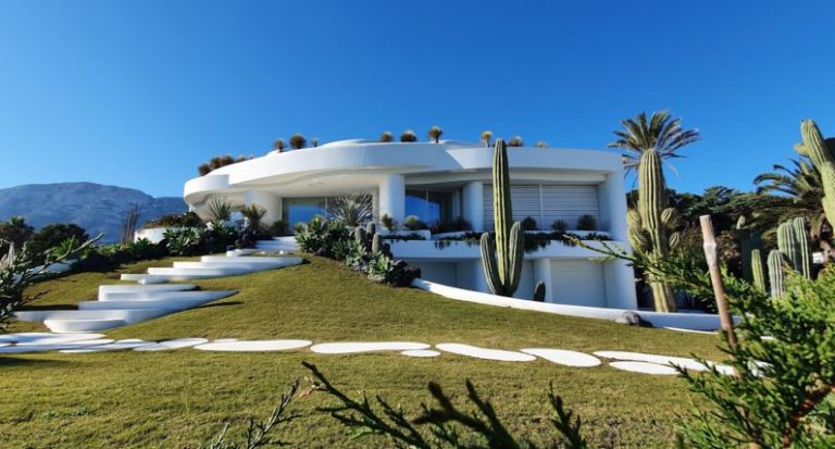 Luxury Property - white concrete building under blue sky during daytime